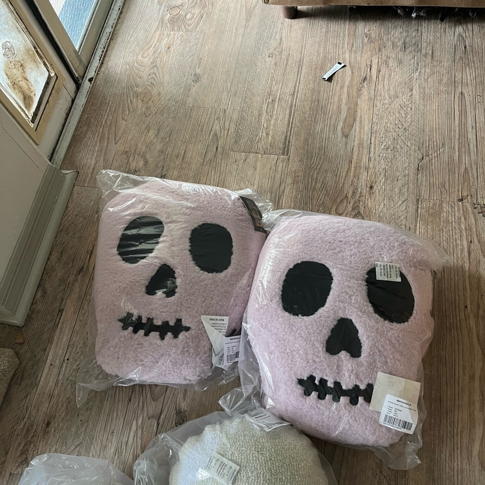 Set two Cynthia Rowley lavender skulls pillows